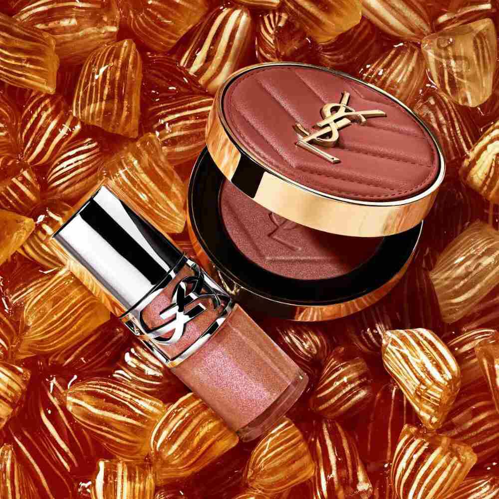 YSL shimmer blush and gloss on amber candies