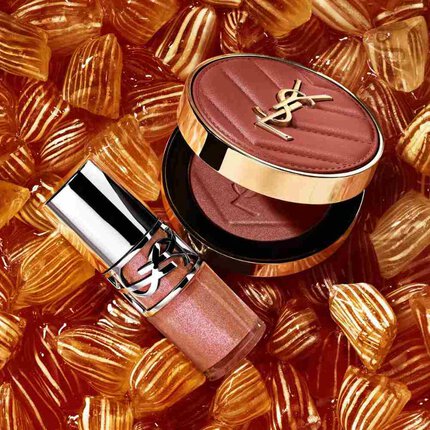 YSL shimmer blush and gloss on amber candies
