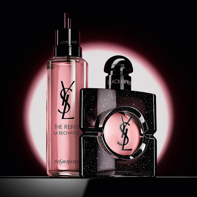 Black Opium Eau de Parfum bottle shown next to its 100ml glass refill bottle with the YSL logo.