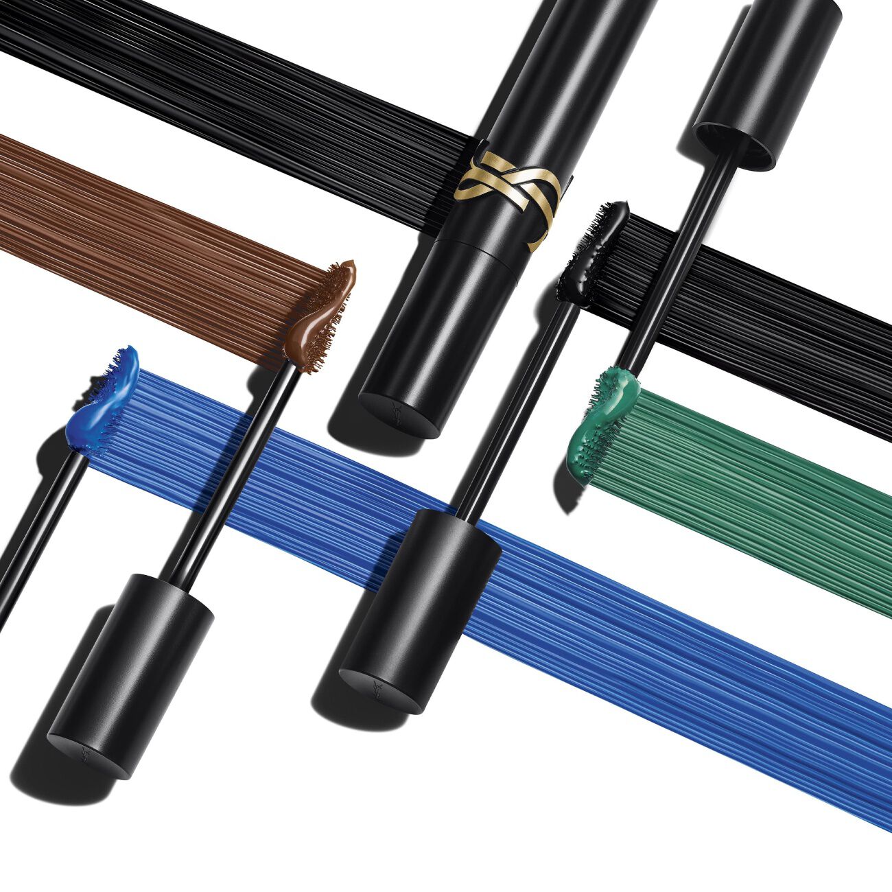 YSL mascaras and color swatches in black, brown, blue, and green.