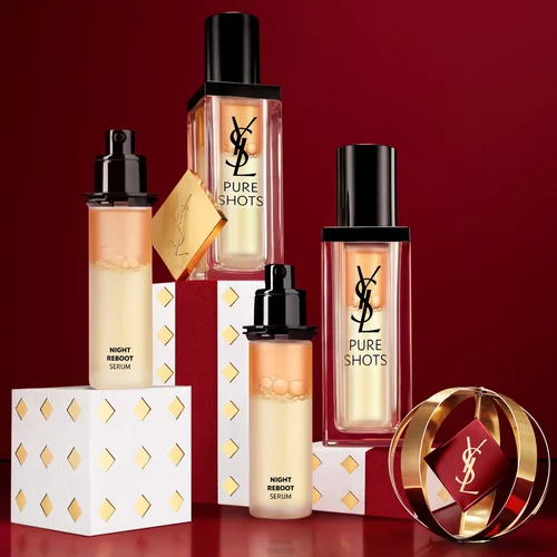 YSL Pure Shots Night Reboot serum bottles and festive packaging.