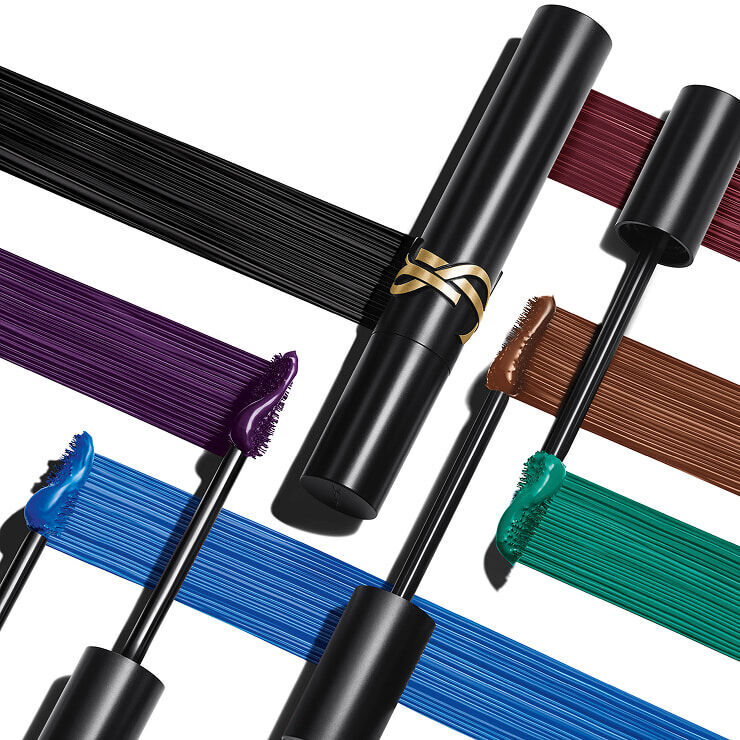 Product display featuring a black mascara tube surrounded by several wands and smears in black, burgundy, purple, blue, green, and brown.