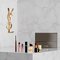 YSL beauty gift set with mini products and pouch.