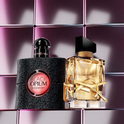 YSL beauty products on a pedestal by the water