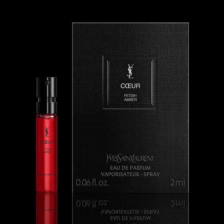 COEUR Eau de Parfum sample placed next to the full black packaging for the YSL trial service.