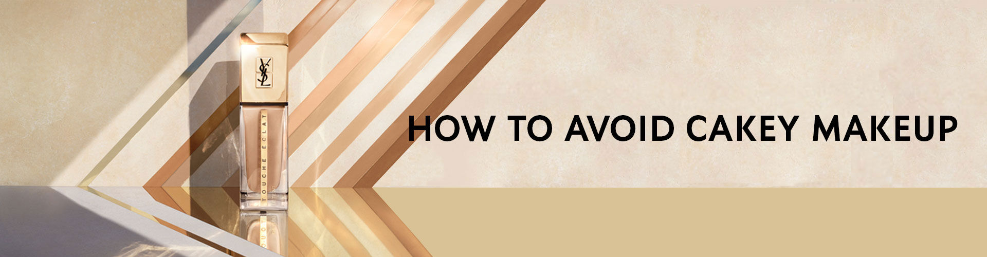A sleek foundation bottle on a reflective surface with a muted, elegant background featuring geometric lines, accompanied by the text "How to Avoid Cakey Makeup."