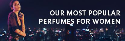 A woman in a stylish outfit poses against a nighttime city skyline, promoting a collection of popular perfumes for women.