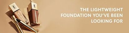 A minimalist display featuring two bottles of foundation and a makeup applicator on a smooth, neutral background, accompanied by the text promoting a lightweight foundation.