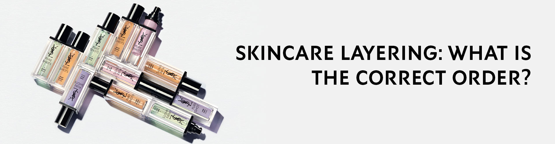 Alt text: A collection of skincare products arranged strategically, with a question about the correct order for skincare layering.