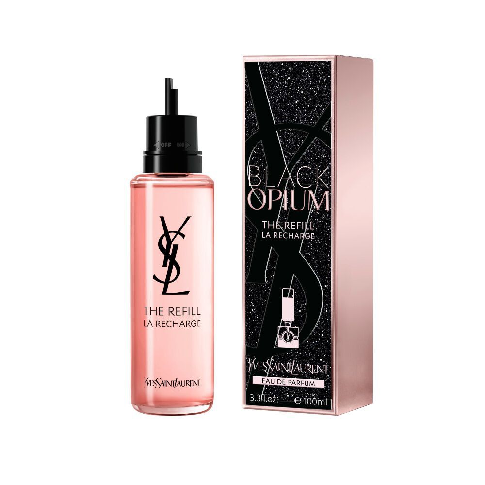 Black Opium Eau de Parfum refill bottle next to its matching black glittery box featuring the YSL Cassandre.