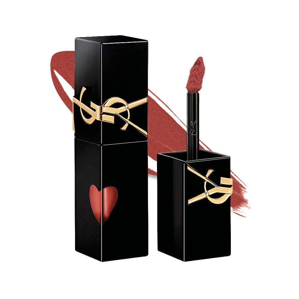 Glossy black YSL lip stain bottle next to its open cap and applicator brush, displayed in front of a shiny liquid texture swatch.