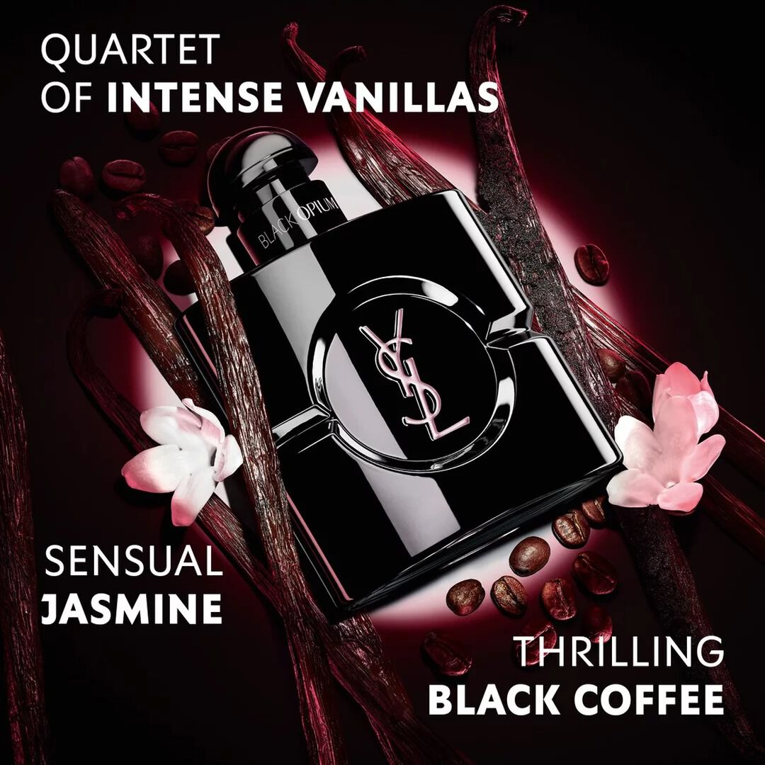 Black Opium Le Parfum bottle in glossy black, surrounded by dark vanilla pods and white jasmine with claims.