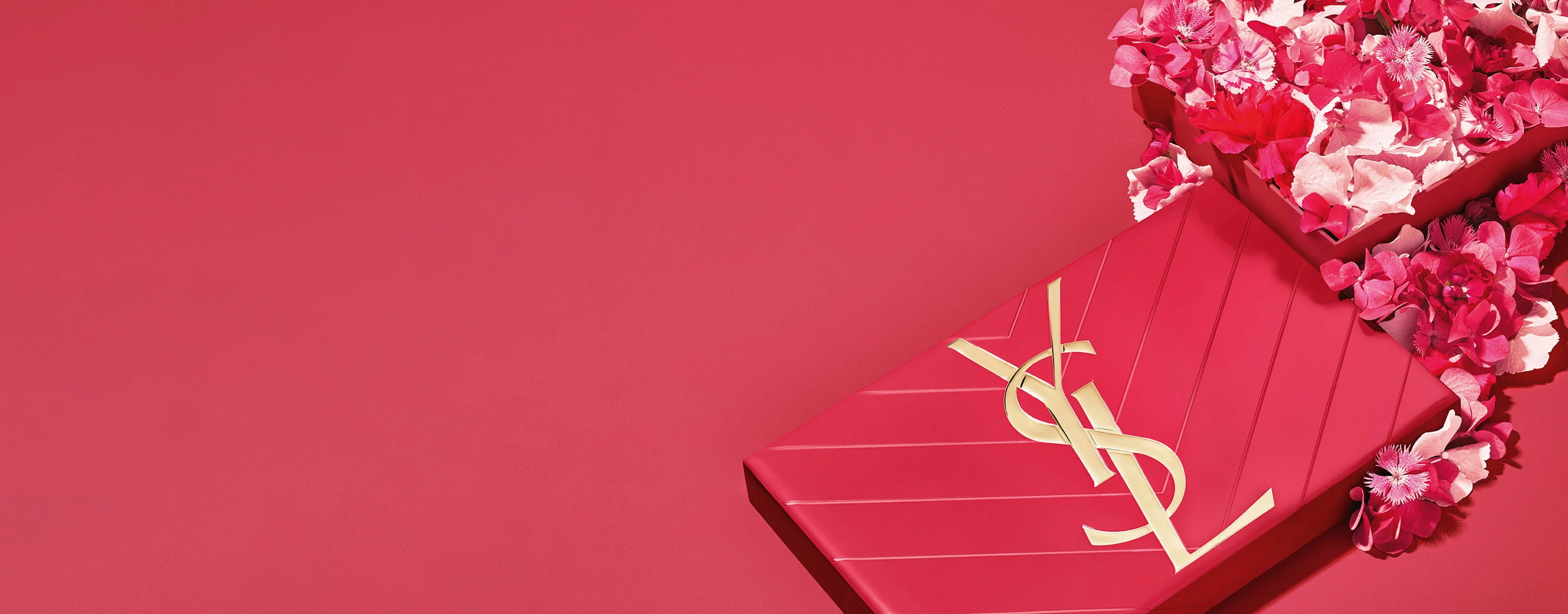 YSL Mother's day pink gift set, featuring the iconic Cassandre logo, overflowing with delicate pink floral accents.