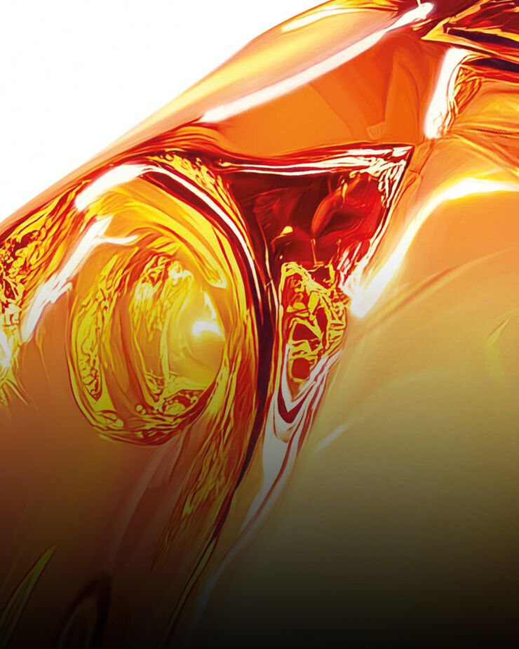 Glossy golden liquid texture representing ectoin
