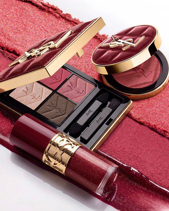 YSL Holiday makeup duo on burgundy texture strokes with palette and gloss