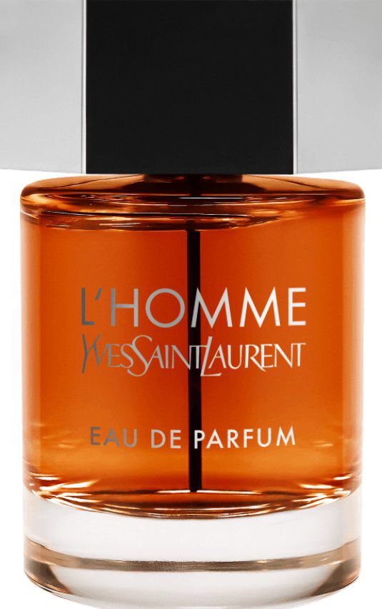 A bottle of Yves Saint Laurent L'Homme Eau de Parfum fragrance with a clear glass body, rich amber liquid, and a silver hexagonal cap.