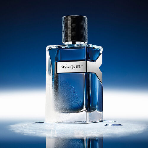 YSL Y Eau de Toilette Intense Iced Cologne 100ml bottle, frosted with 
water droplets, reflecting a cool blue ambiance.