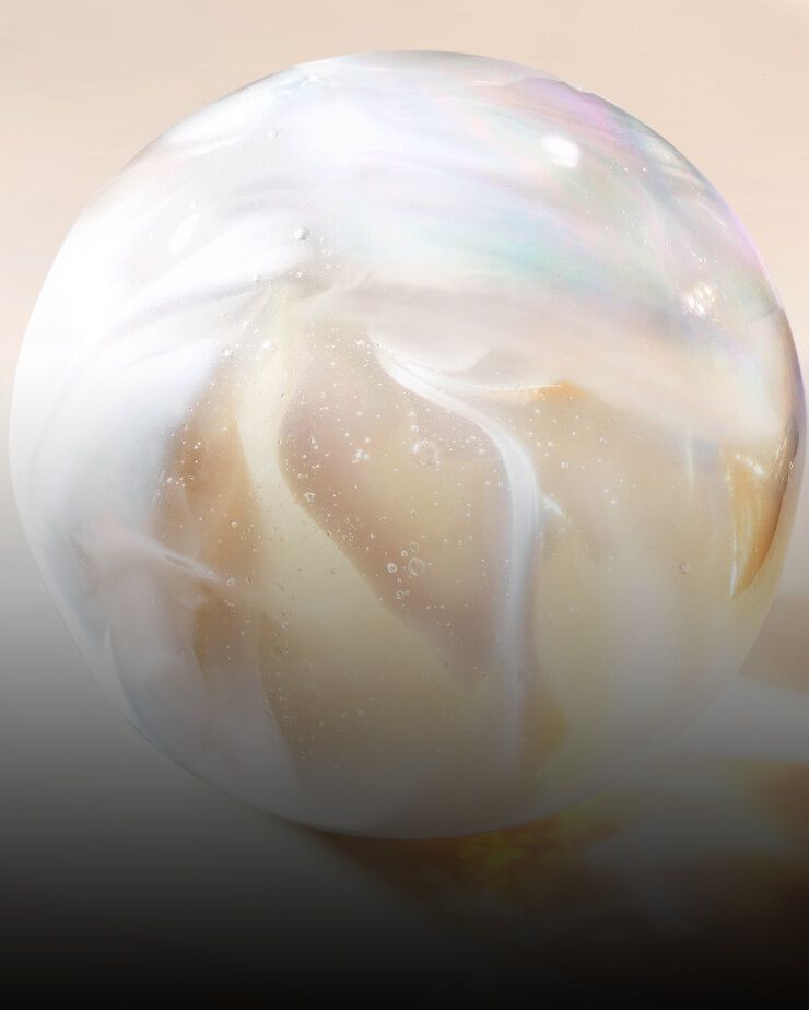 Pearlescent translucent sphere representing Alpha-Panthenol Complex