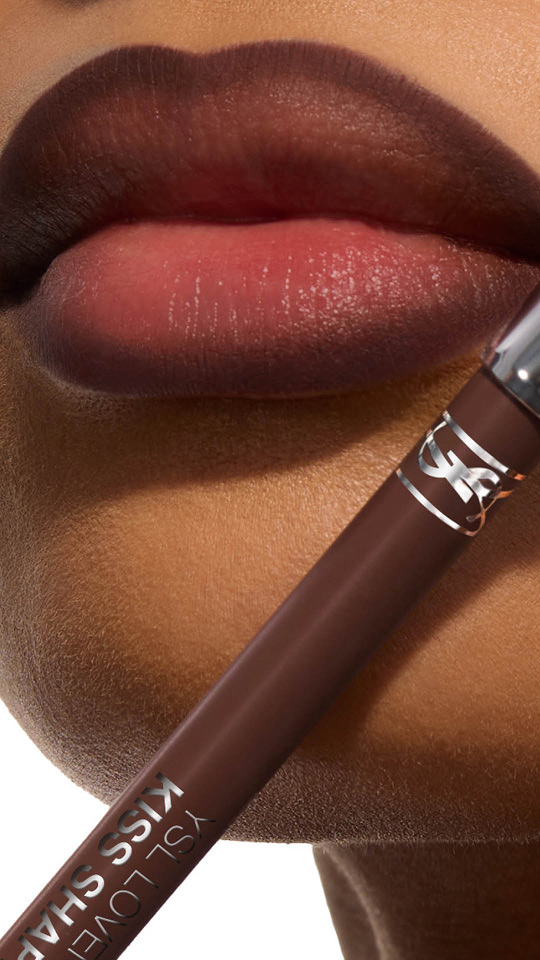 Vertical close-up of ombre brown lips with a matching YSL Kiss Shaper lip pencil.