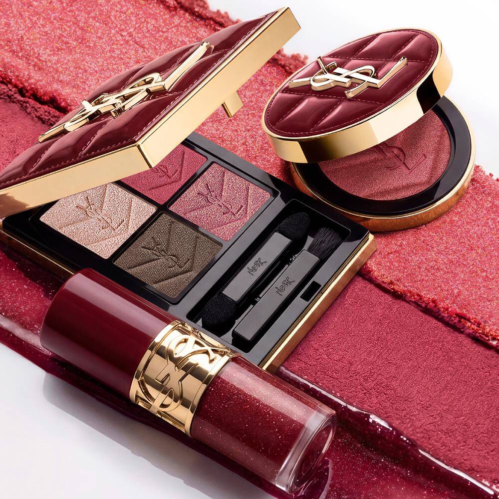 YSL Holiday makeup duo on burgundy texture strokes with palette and gloss